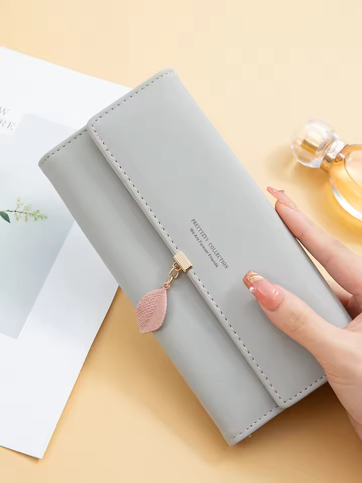 Hot Selling spring and summer new women's PU leather Japanese and South Korea small fresh leaf pendant three fold bag
