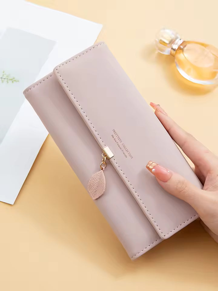 Hot Selling spring and summer new women's PU leather Japanese and South Korea small fresh leaf pendant three fold bag