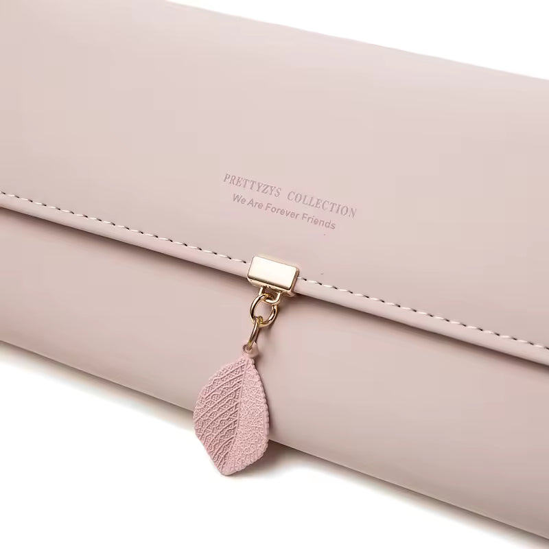 Hot Selling spring and summer new women's PU leather Japanese and South Korea small fresh leaf pendant three fold bag